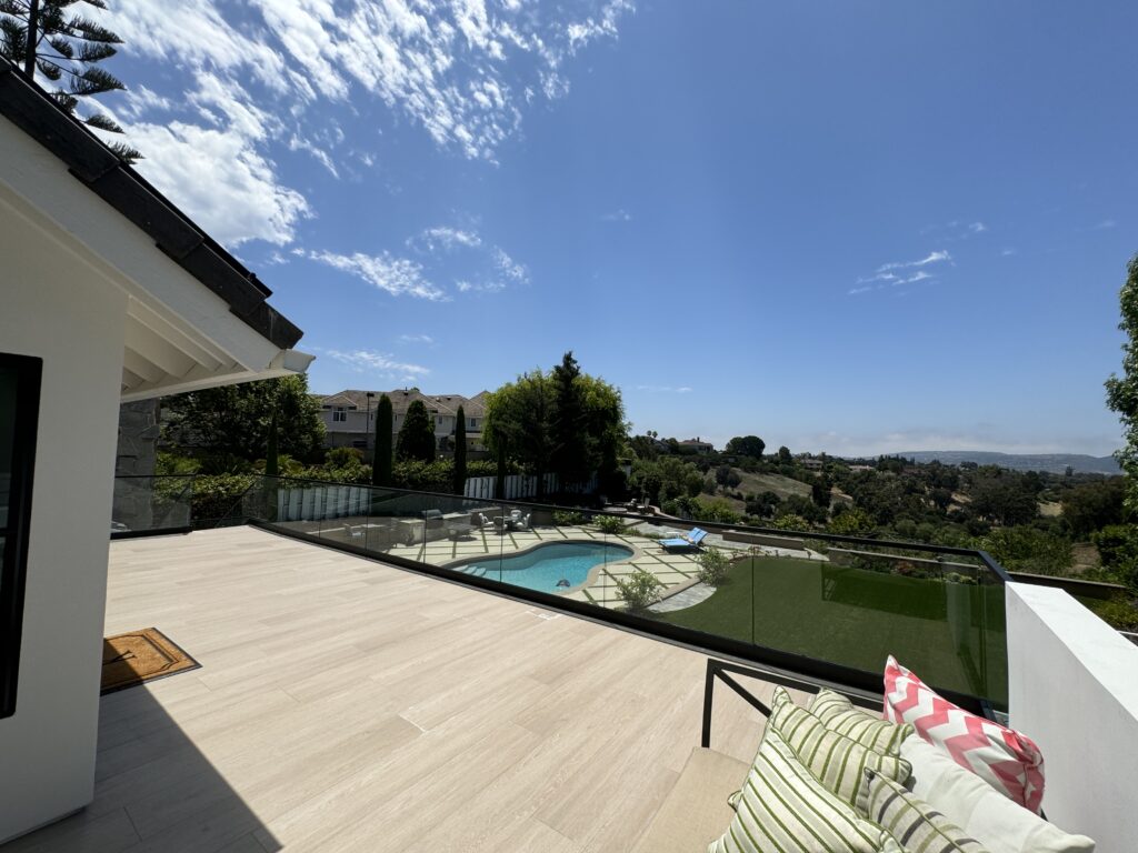 Outdoor Glass Railing System in the backyard of a house in Laguna Hills, CA